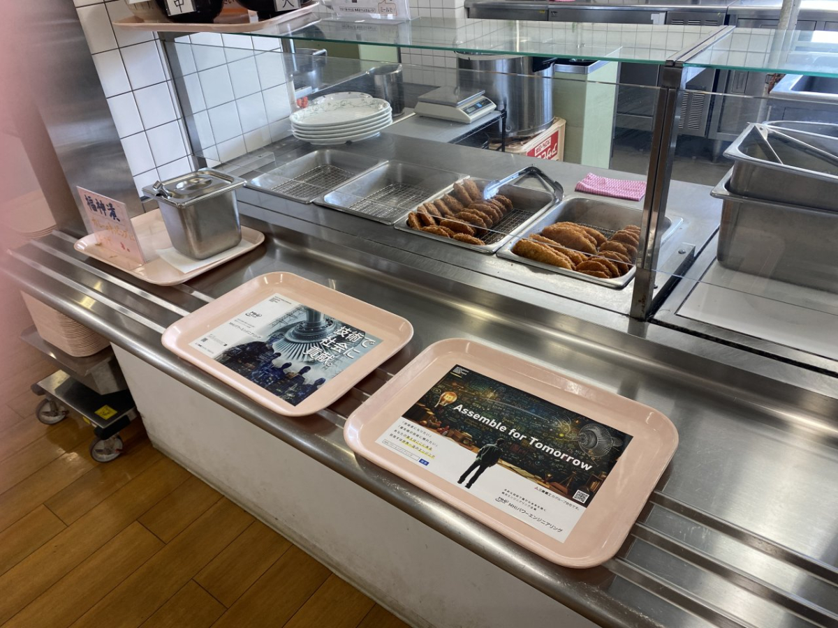 大阪電気通信大学寝屋川キャンパスの学食トレイへ広告掲載